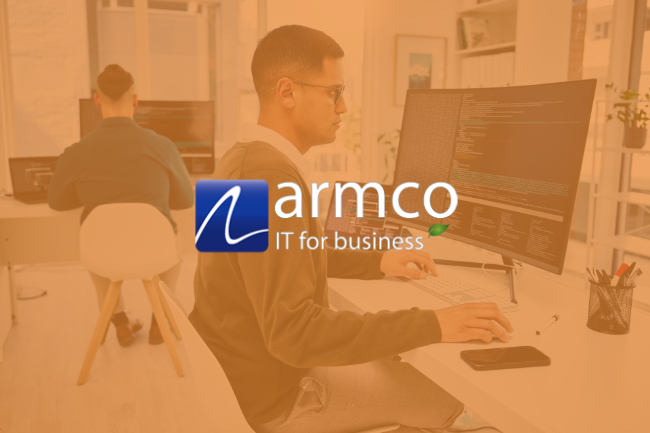 Featured image of man working at desk - Armco IT Support York
